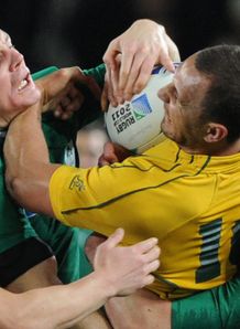 Brian O Driscoll thumping Quade Cooper in Ireland versus Australia at World Cup Brian O Driscoll thumping Quade Cooper in Ireland versus Australia at World Cup