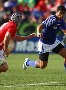 Wales v Samoa - George Pisi attempts to take on Jonathan Davies Wales v Samoa - George Pisi attempts to take on Jonathan Davies