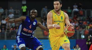 Australia's Adam Gibson takes on Ogo Adegboye of Britain.