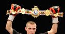 Quigg hits back to defend title