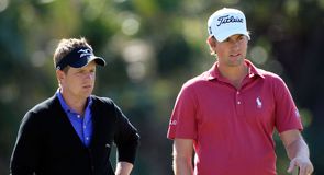 Luke Donald (L) and Webb Simpson (R) are battling it out for the PGA Tour money list title this week.