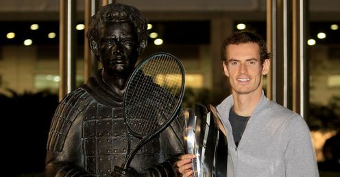 A born warrior: Murray stands alongside his terracotta likeness after winning in Shanghai