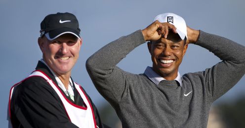 A relaxed looking Tiger Woods with his new caddy Joe La Cava.