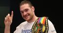Fury gives up belts