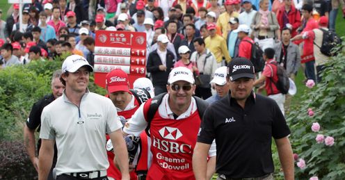 Rory McIlroy (L) & Graeme McDowell during Sunday's final round in Shanghai.
