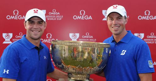Gary Woodland and Matt Kuchar pose with the World Cup
