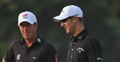 Richard Green (L) and Brendan Jones discussing a putt