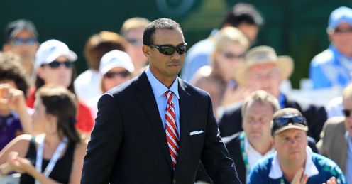 Woods walks out during Wednesday's opening ceremony in Melbourne.