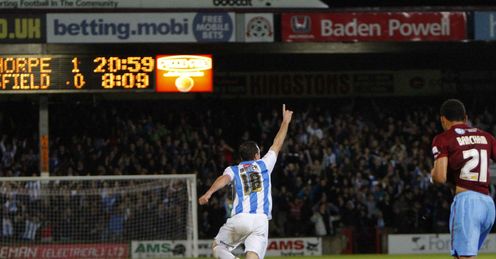 Tommy Miller: Has helped Huddersfield to stretch their unbeaten run to 41 games