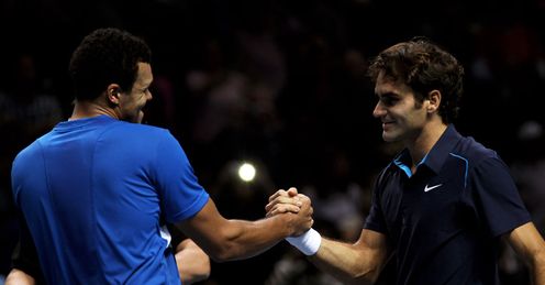Shake down: Tsonga is all smiles despite his failure to prise the trophy from Federer