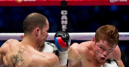 Frog splashed: Cintron (left) fell prey to to a majestic Alvarez performance
