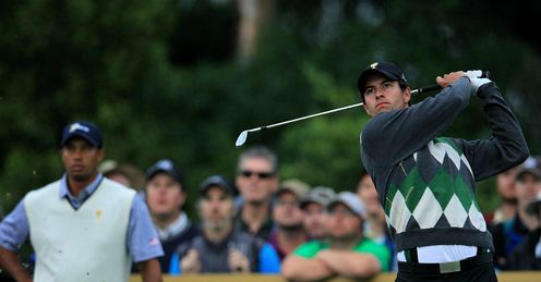 Woods looks on as Scot tees off in a match the American would relish