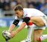Sinfield home at last