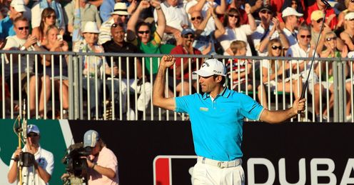 Alvaro Quiros reacts after nailing the eagle putt on 18.