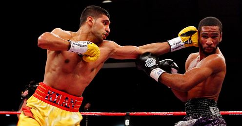 Khan started brightly against Peterson