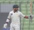 Taufeeq ton drives Pakistan