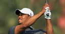 Tiger shares lead in Abu Dhabi