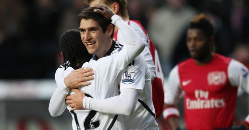 Swans to watch: Graham hugs Dyer during win over Arsenal