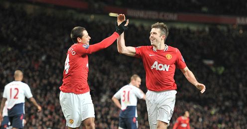 Michael Carrick and Javier Hernandez