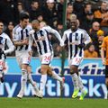 West Brom celebrate after Peter Odemwingie's hat-trick inspired an emphatic victory