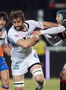 Brive lock Arnaud Mela C is tackled by Lyon Brive lock Arnaud Mela C is tackled by Lyon