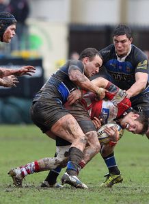 Rory Lawson tackled by Olly Barkley and Francois Louw in Bath v Gloucester Rory Lawson tackled by Olly Barkley and Francois Louw in Bath v Gloucester