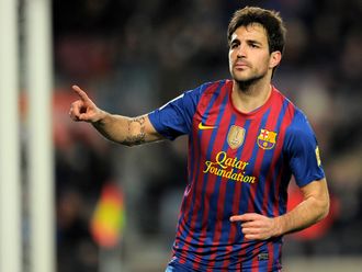 Cesc Fabregas celebrates his goal.