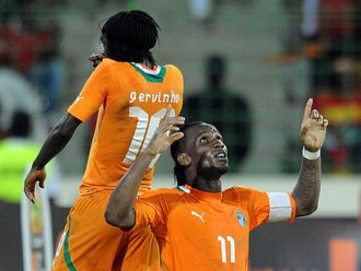 Gervinho and Drogba celebrate