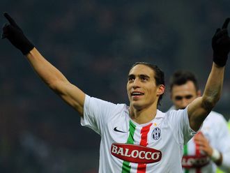 Martin Caceres celebrates his second goal.