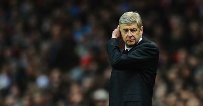 Wenger targets top four