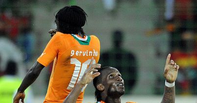 Gervinho and Drogba celebrate