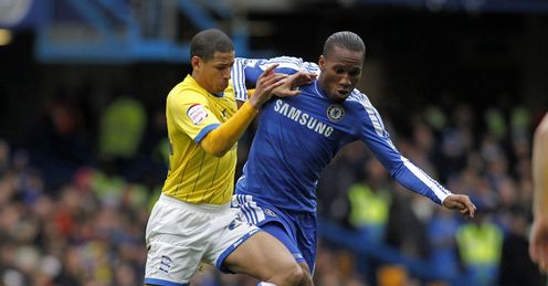 Drogba, back from the Africa Cup of Nations, gets stuck in against Birmingham