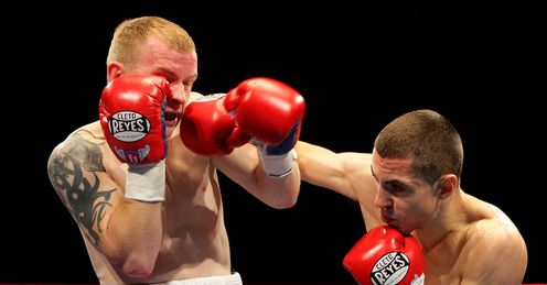 Recovery: Quigg (right) showed his battling qualities against Arthur
