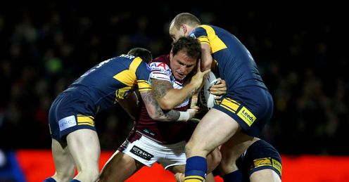 Anthony Watmough Manly Sea Eagles stopped by two Leeds players 2012 World Club Challenge