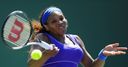 Williams sisters advance