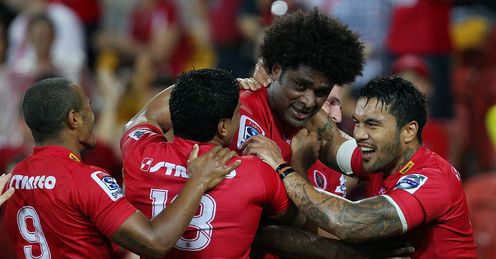 The Reds celebrate Radike Samos try The Reds celebrate Radike Samos try