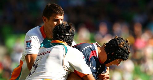 Izak van der Westhuizen tackles Tim Davidson Izak van der Westhuizen tackles Tim Davidson