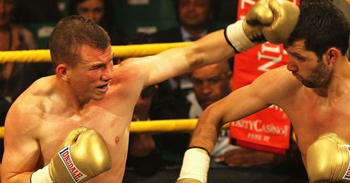 Welsh wizard: Buckland (left) levels Truscott with a powerful shot