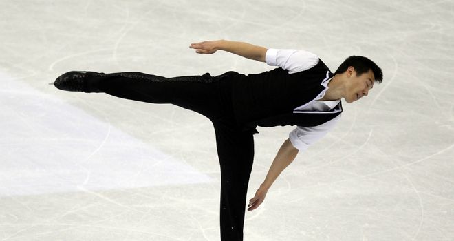 Skating: Chan retains title