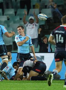 Bernard Foley scoring for Waratahs in Sydney Bernard Foley scoring for Waratahs in Sydney