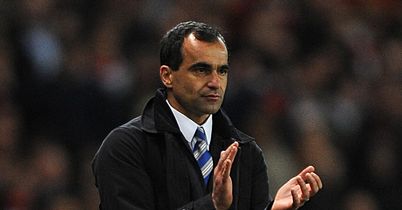 Martinez talks under way