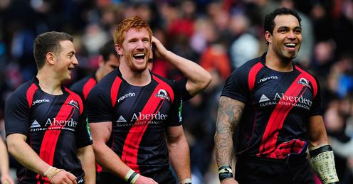 Three-mendous: Greg Laidlaw, Roddy Grant and Netani Talei celebrate victory over Toulouse