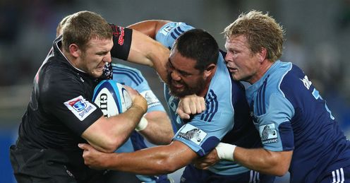 Jean Deysel is tackled by Charlie Faumuina C and Daniel Braid Jean Deysel is tackled by Charlie Faumuina C and Daniel Braid