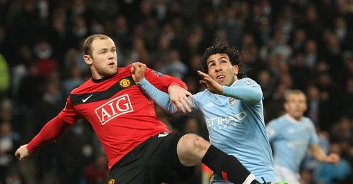 Rivalries renewed: Rooney and Tevez tussle in 2010. Who will come out on top this time?