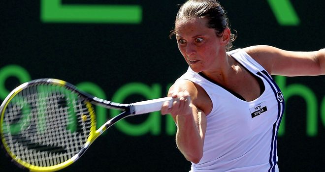 Vinci falls to Halep