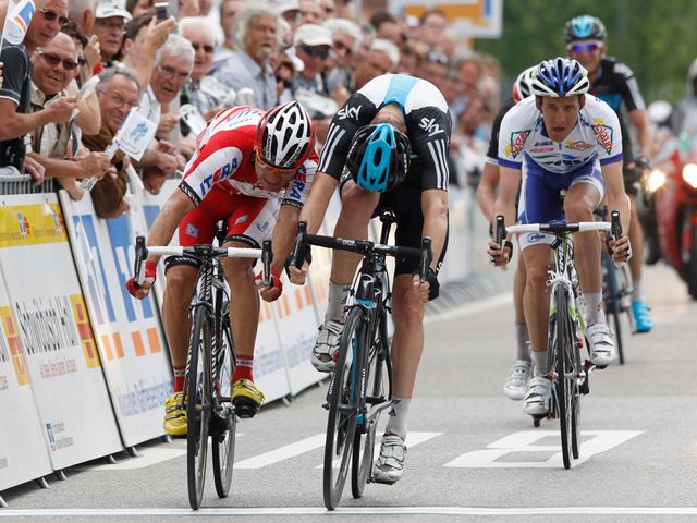 Michael Rogers narrowly edged out Vladimir Gusev on stage two to take the lead