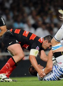 Toulouse s number eight Louis Picamoles C tackled Castres s player Romain Martial Toulouse s number eight Louis Picamoles C tackled Castres s player Romain Martial