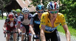 Bradley Wiggins extended his lead at the top of the overall standings on stage six