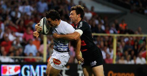 Vincent Clerc denies Max Evans with a try-scoring tackle Vincent Clerc denies Max Evans with a try-scoring tackle