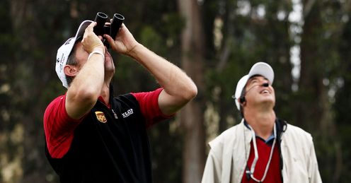 Lee Westwood serached for his ball on the fifth hole.